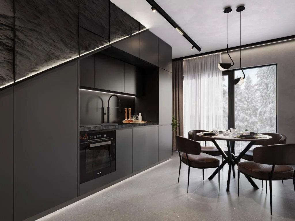 Premium dark kitchen and dining area with winter forest view